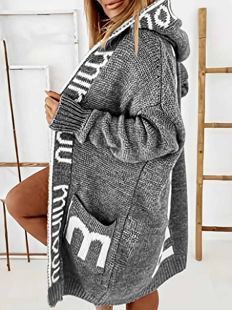 Charcoal-gray hooded knit cardigan with white geometric trim, long sleeves, front pockets