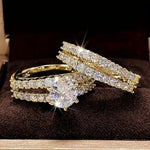 Brilliance Eternă gold ring set with pavé stones and a round center gem