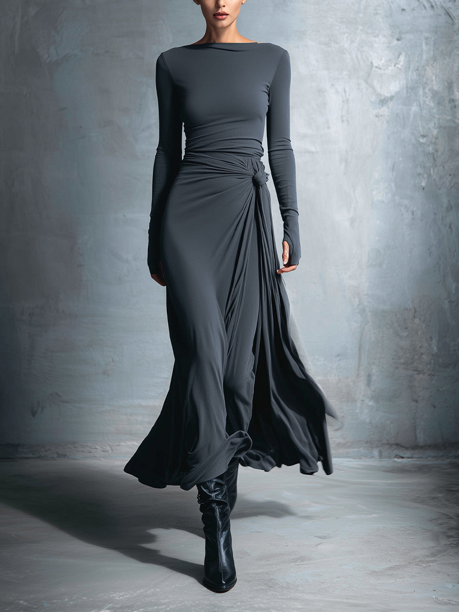 Maxi silk dress with long sleeves, draped side knot at waist, flowing dark skirt