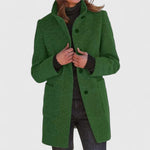 Green classic button-front coat with notch lapels, long sleeves, and side pockets