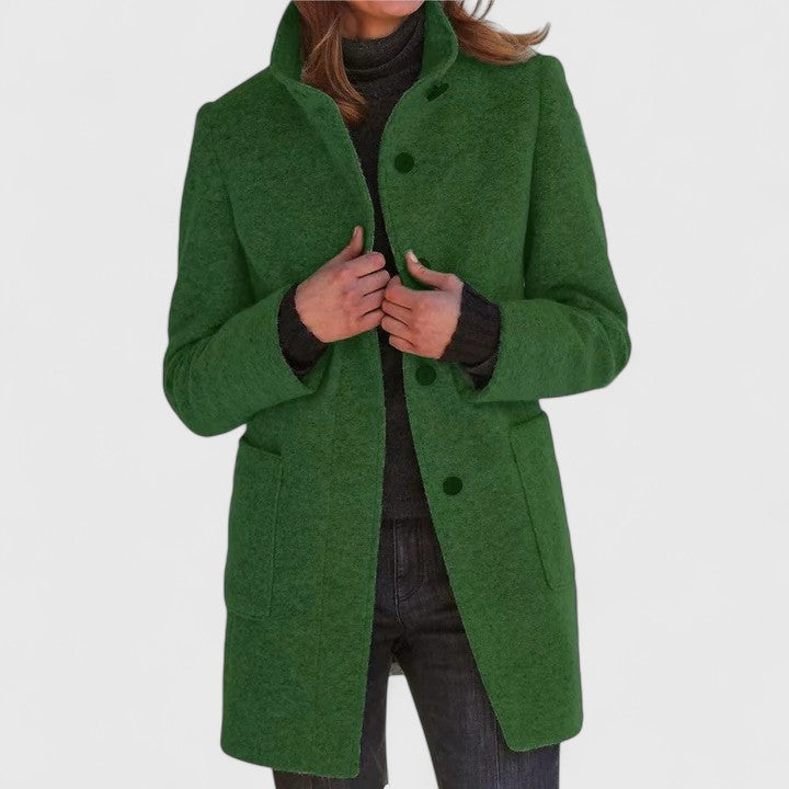 Green classic button-front coat with notch lapels, long sleeves, and side pockets