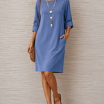 Blue midi shift dress with 3/4 sleeves and round neckline