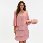 Pink layered ruffle shift dress with draped scoop neckline and tiered skirt