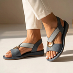 Flat slide sandals in dark blue with black straps, wide buckle ring detail