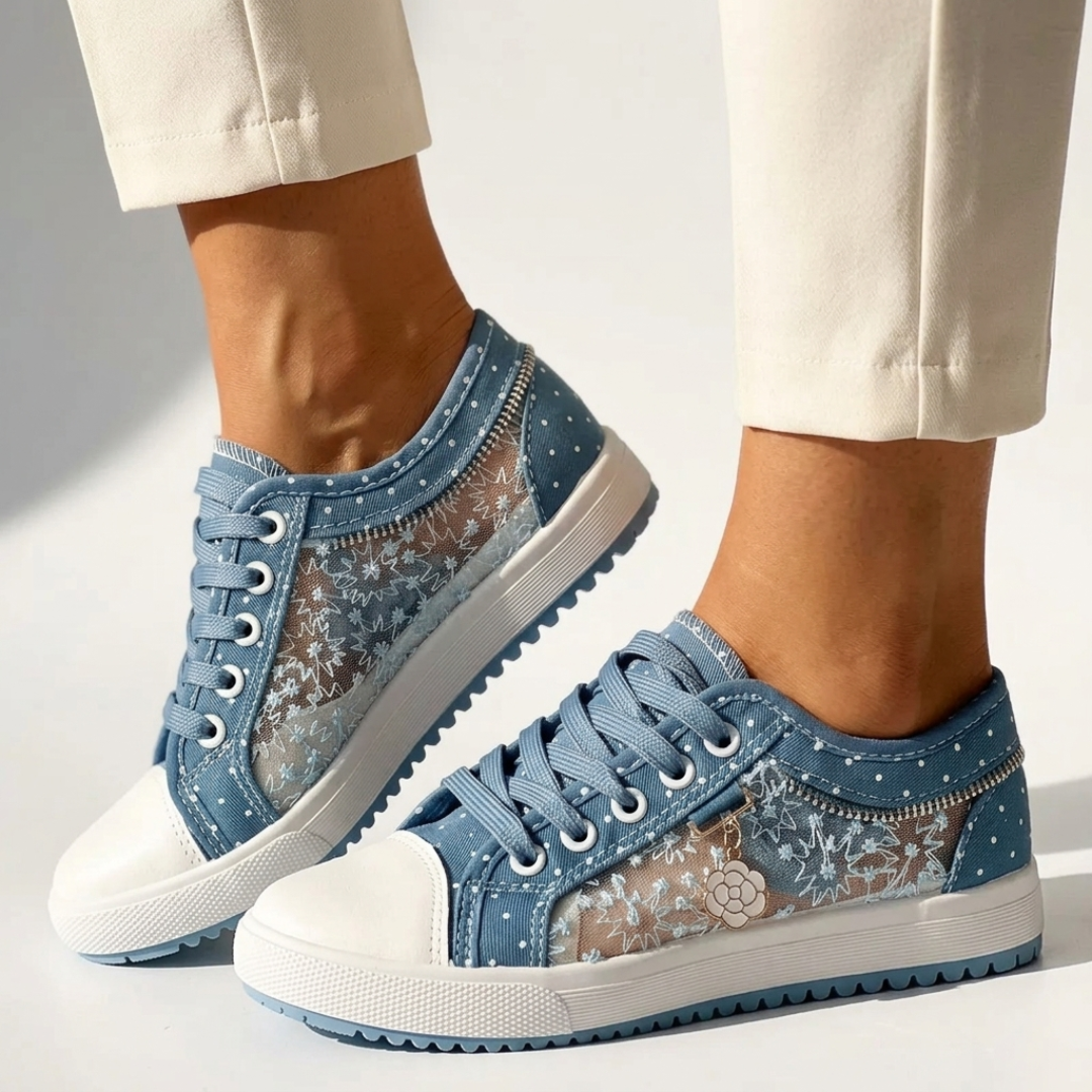 Light blue floral-pattern low-top sport sneakers, lace-up with white rubber toe