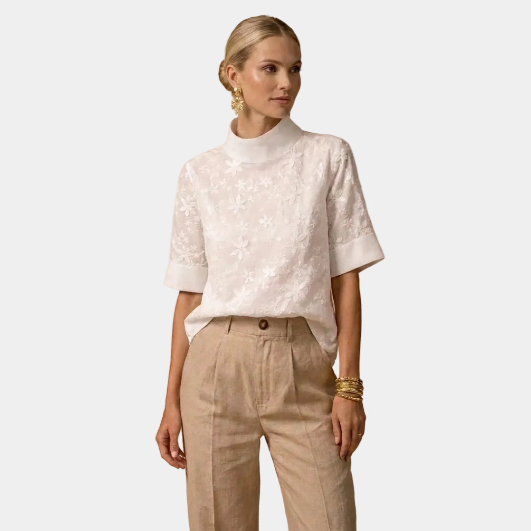 Women's white floral short-sleeve blouse with high neckline