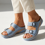 Light blue orthopedic sandals with two buckles, perforated straps, and open toe