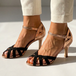 Black high-heel strappy sandals with ankle strap and open toe, crisscross bands