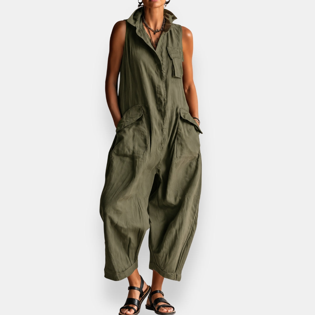Olive green sleeveless jumpsuit with flap pockets and relaxed cropped legs