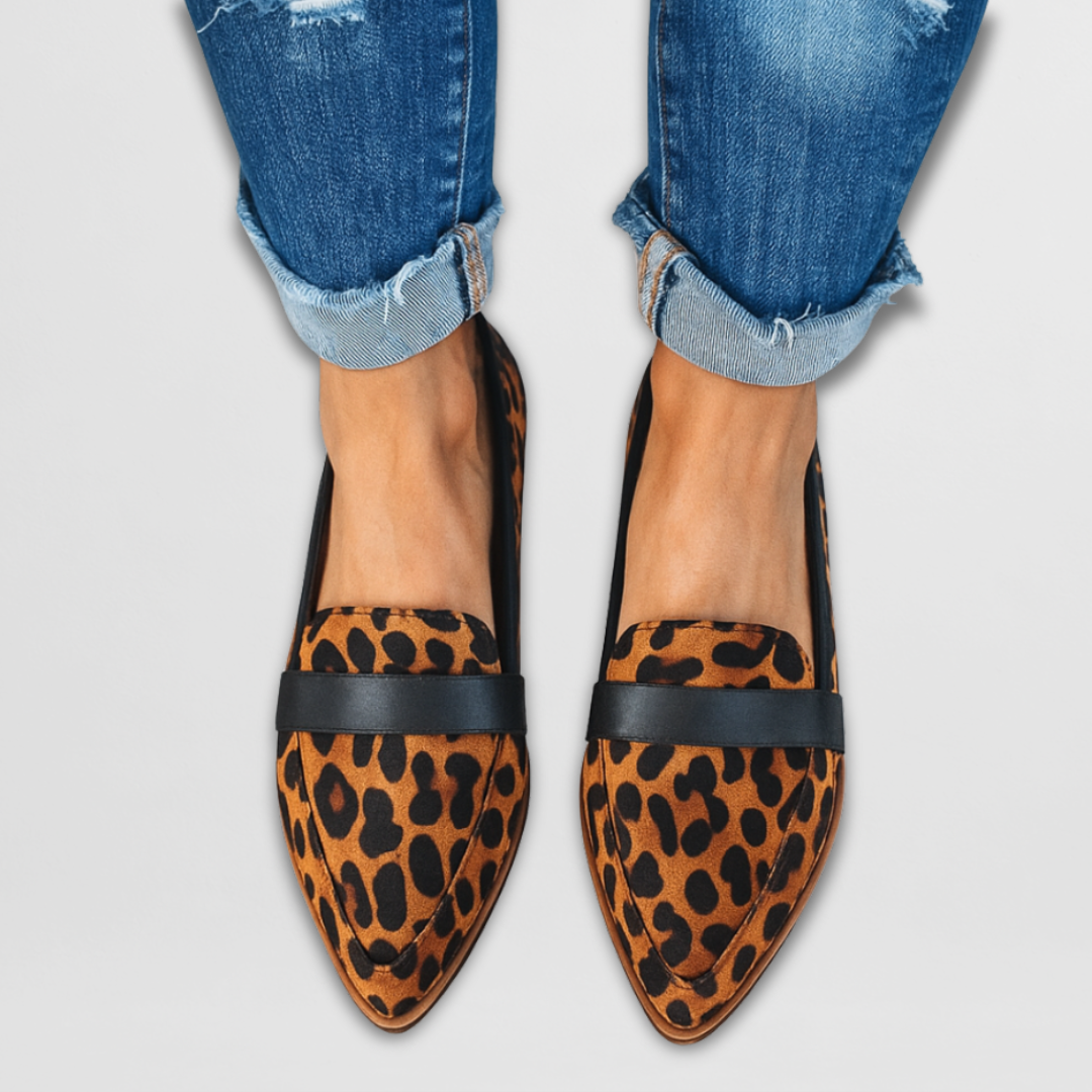 Leopard-print suede leather moccasin loafers with black band across the vamp.