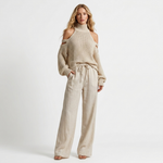 Two-piece cold-shoulder knit top and wide-leg drawstring pants in beige