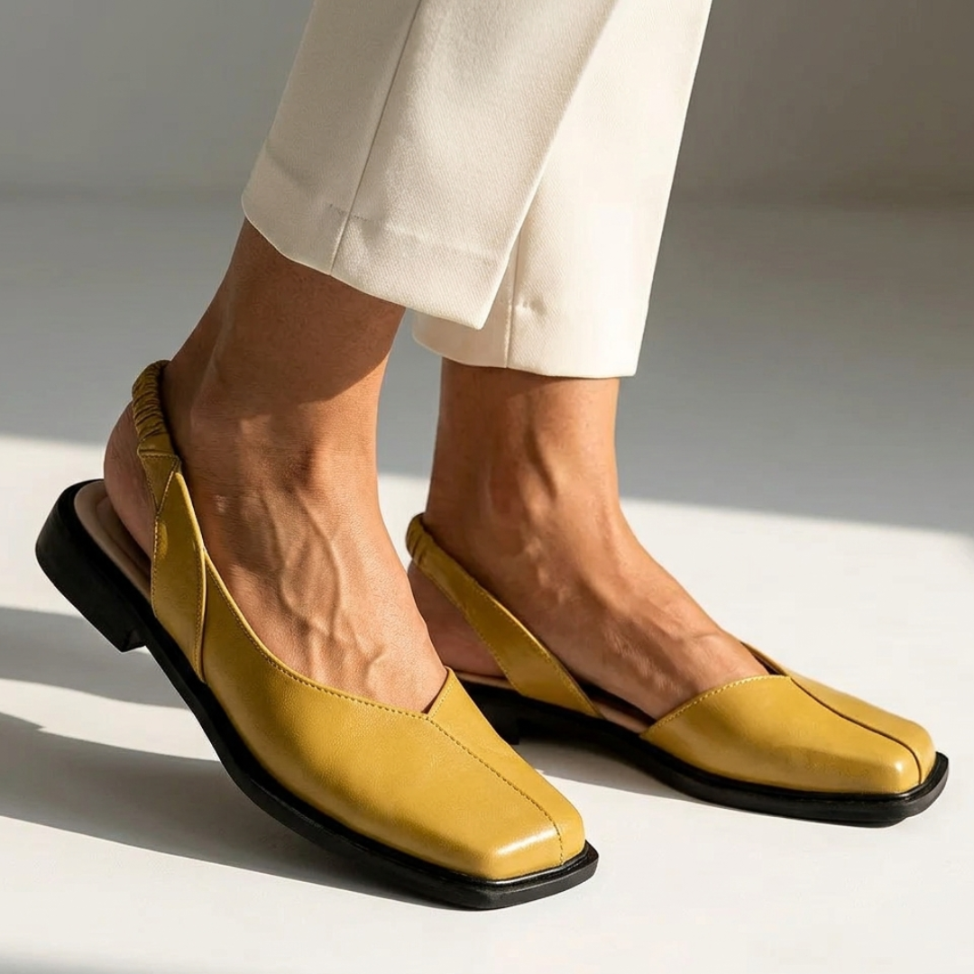 Emanuela square-toe moccasin loafers in mustard with black sole and low heel