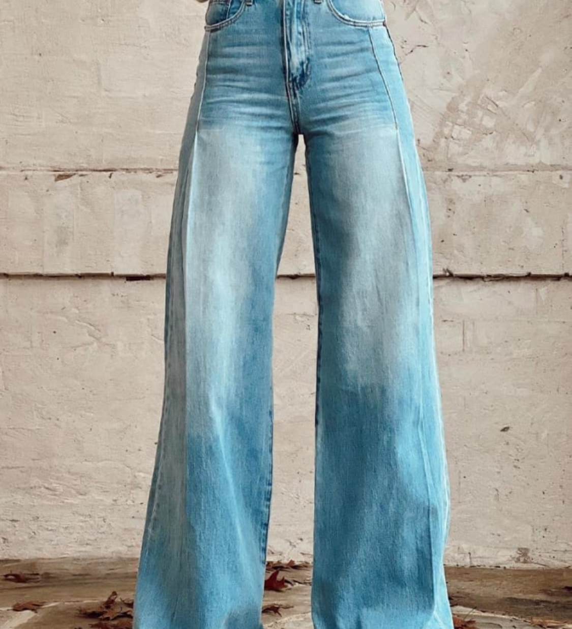 Light blue wide-leg denim pants with high waist and front button fly