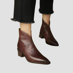 Dark brown leather ankle boots with low block heel and pointed toe