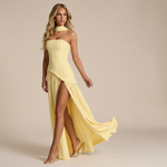 Light yellow strapless maxi dress with asymmetrical drape and side thigh slit