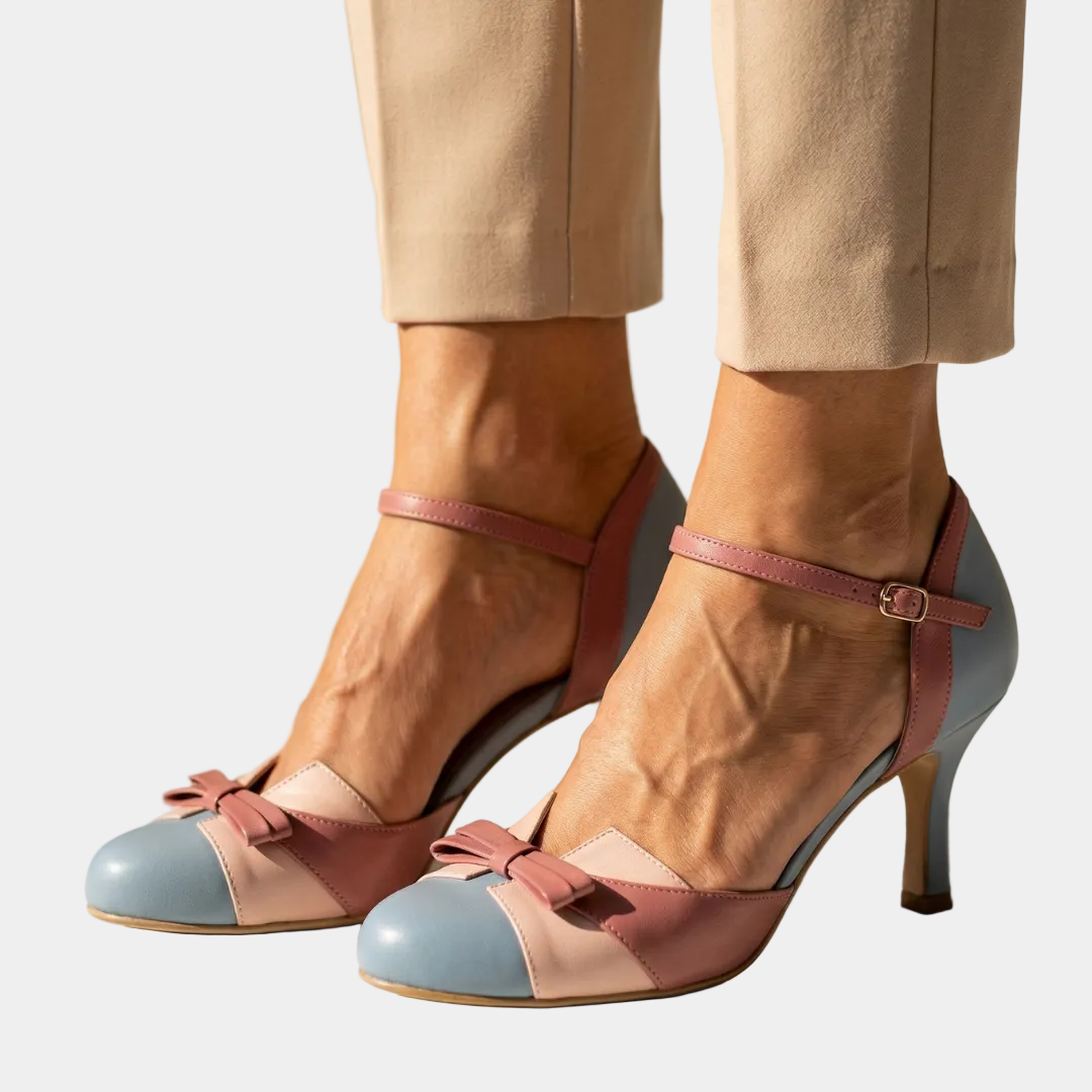 Pink and light-blue leather heeled pumps with bow detail and ankle strap