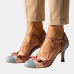 Pink and light-blue leather heeled pumps with bow detail and ankle strap