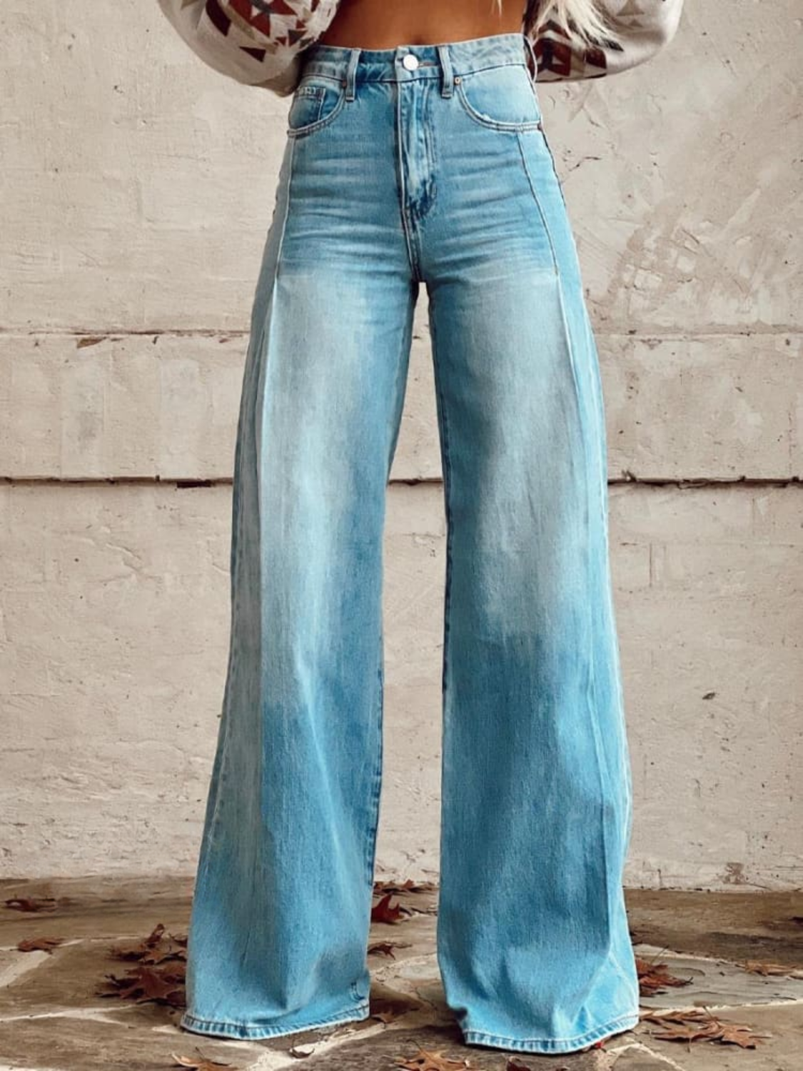 Light blue wide-leg denim pants with high waist and relaxed straight legs
