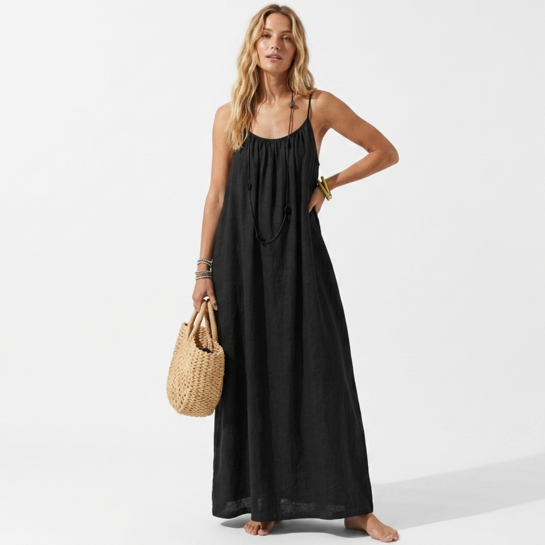 Lightweight black summer dress with spaghetti straps and tie neckline, maxi length