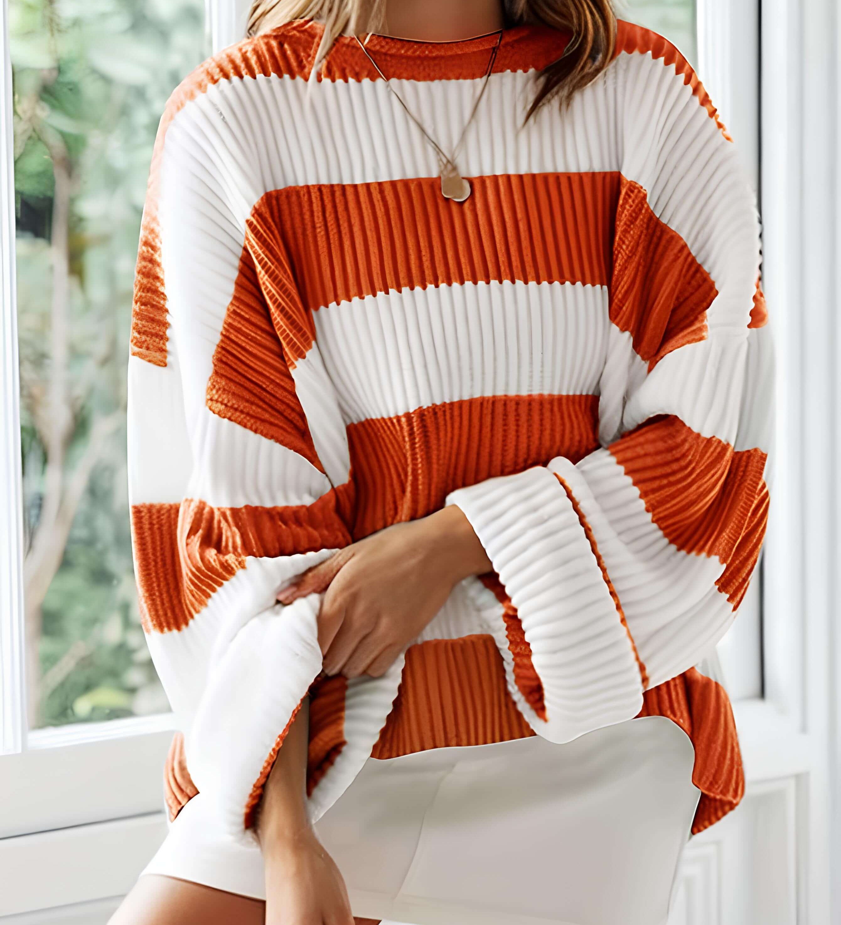 Women’s winter striped knit sweater in white and orange, crew neck, long sleeves