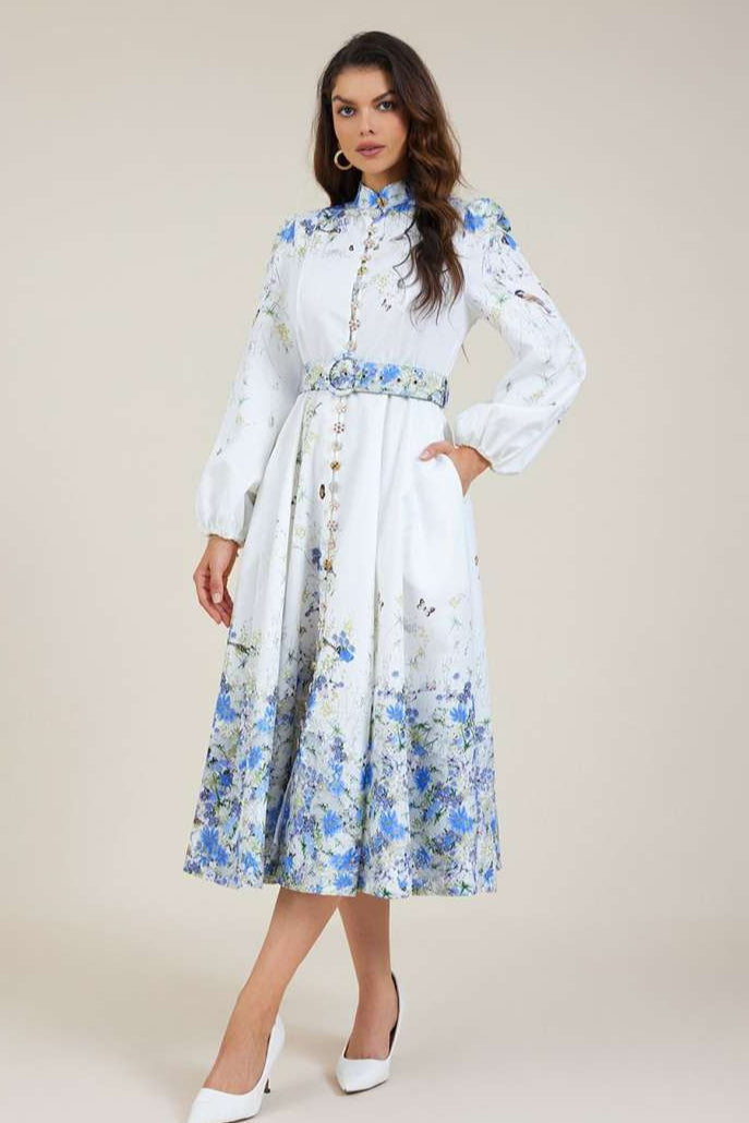 Blue floral midi dress with high collar, button front, long puff sleeves and belt