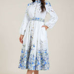 Blue floral midi dress with high collar, button front, long puff sleeves and belt