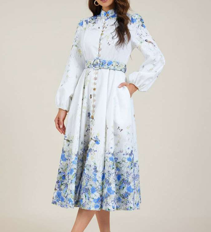 Blue floral midi dress with high collar, button front, long puff sleeves and belt