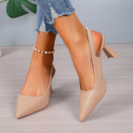 Beige orthopedic pointed-toe high heels with mid block heel and ankle bracelet detail