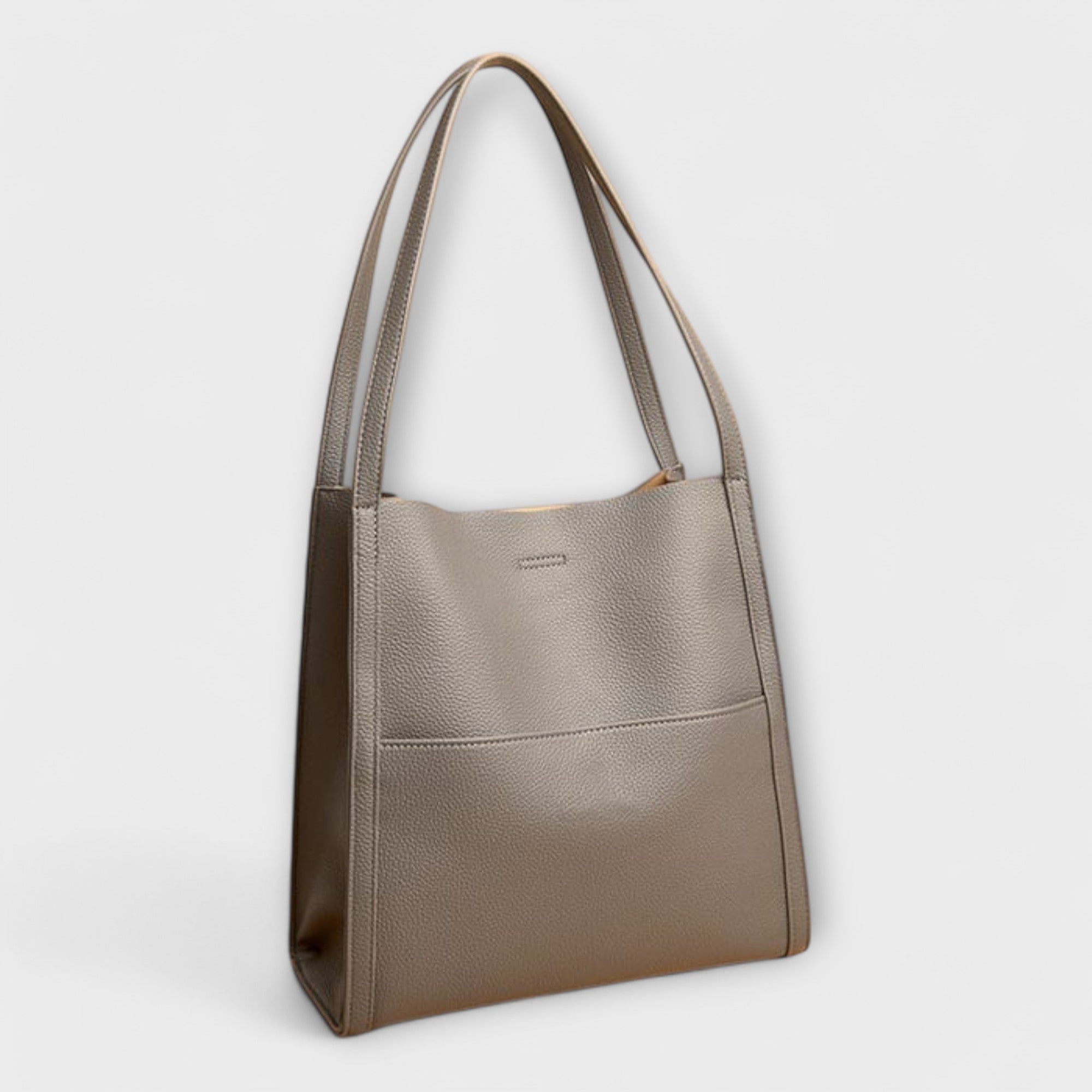 Taupe natural leather tote bag with short handles and simple front tab detail
