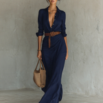 Navy long-sleeve maxi dress with V-neck buttons and belted gathered waist, side view