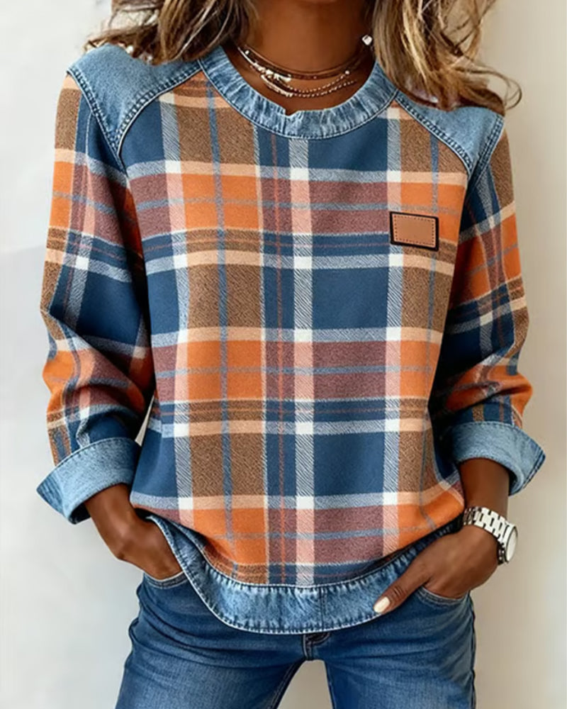 Women’s flannel pullover with denim collar, plaid pattern, and chest patch pocket