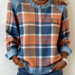 Women’s flannel pullover with denim collar, plaid pattern, and chest patch pocket