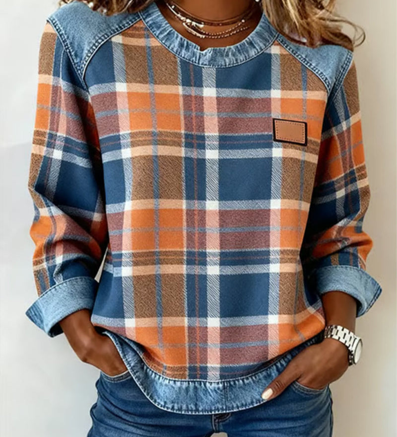 Women’s flannel pullover with denim collar, plaid pattern, and chest patch pocket