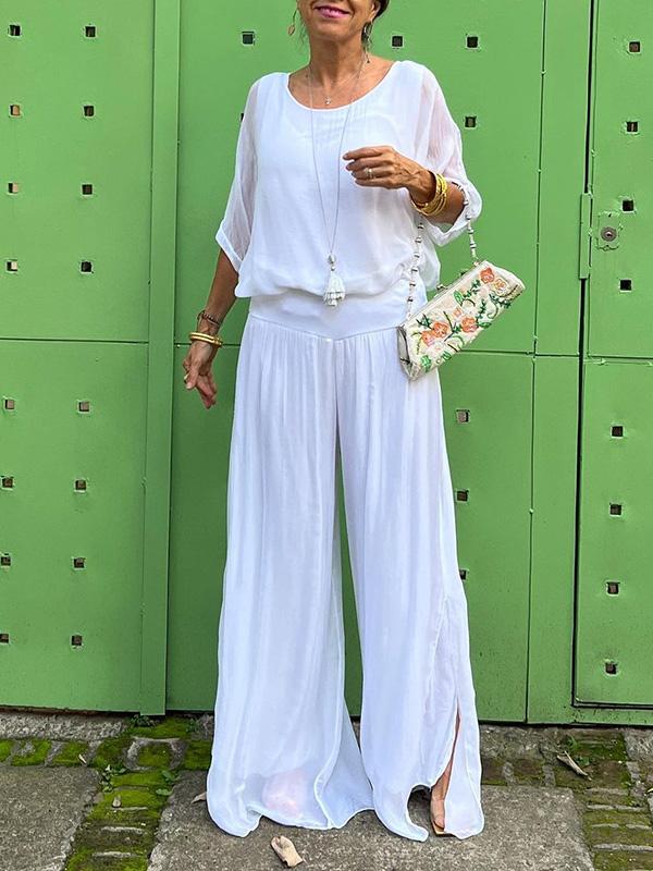 Two-piece chiffon set with loose blouse and wide-leg pants, white.