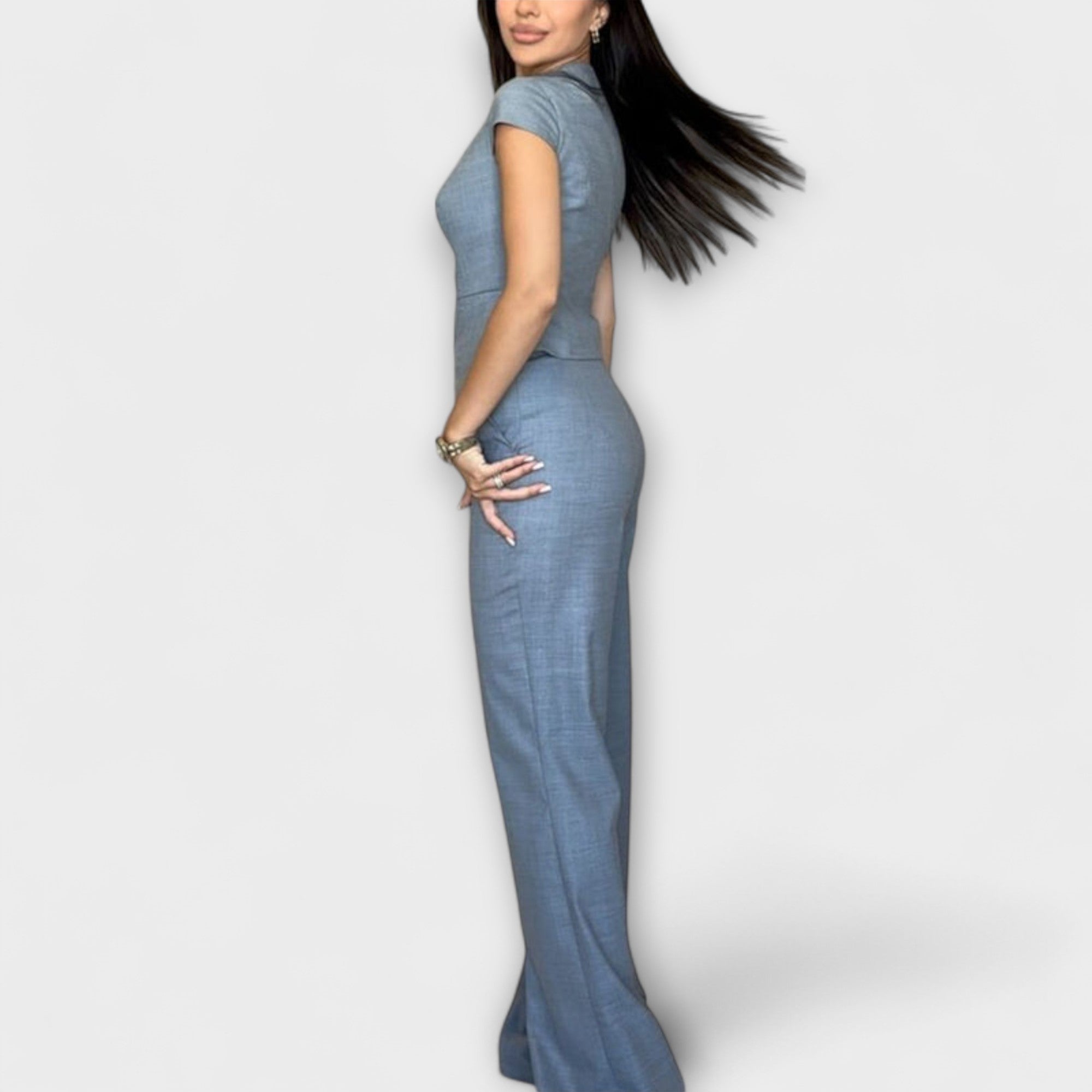 Blue sleeveless V-neck top and wide-leg pants set, side view