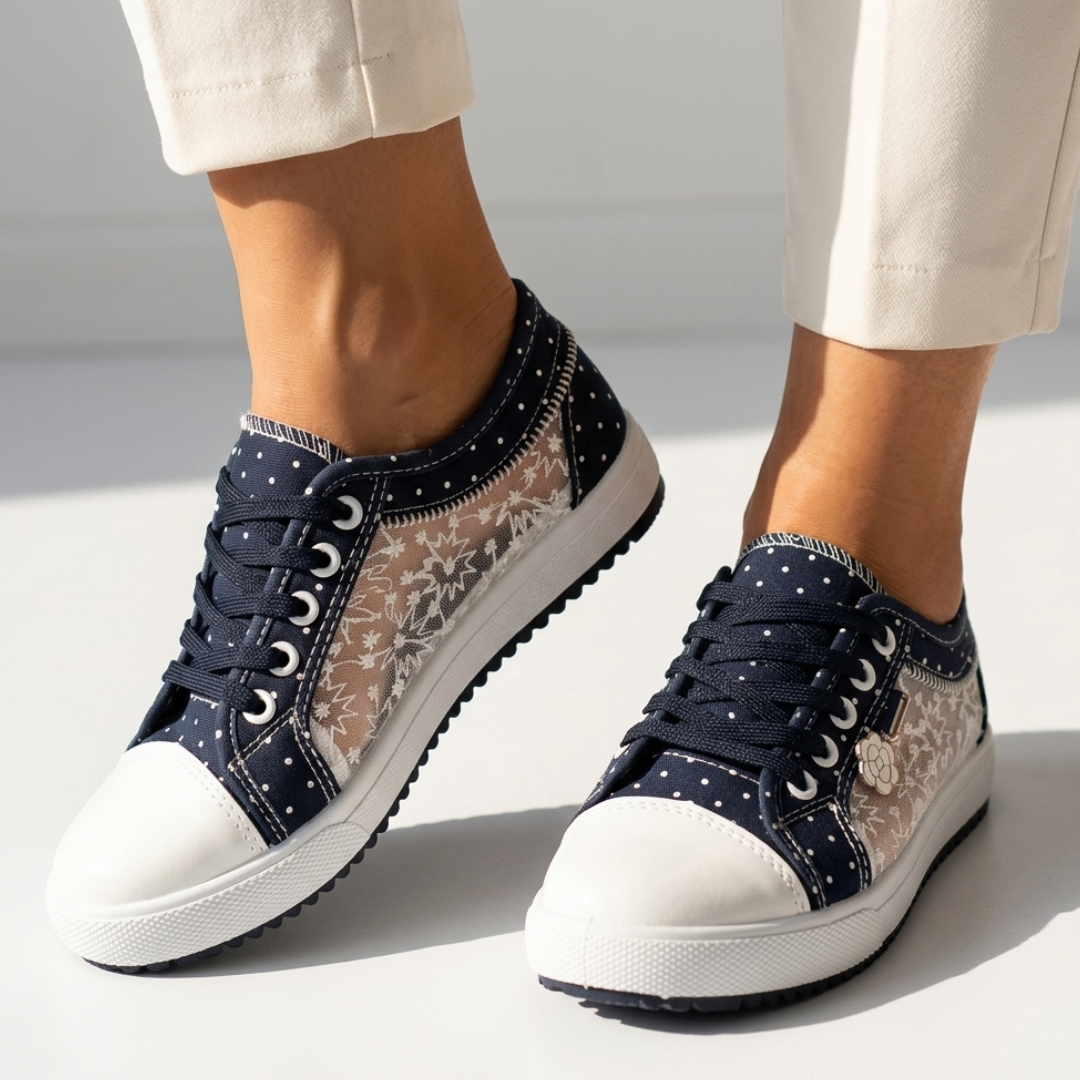 Navy floral-pattern low-top sport sneakers, lace-up with white rubber toe