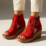Red suede ankle-boot style wedge sandals with open toe and buckle strap