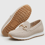 Beige orthopedic moccasin shoes, side view with gold-tone horsebit on textured fabric