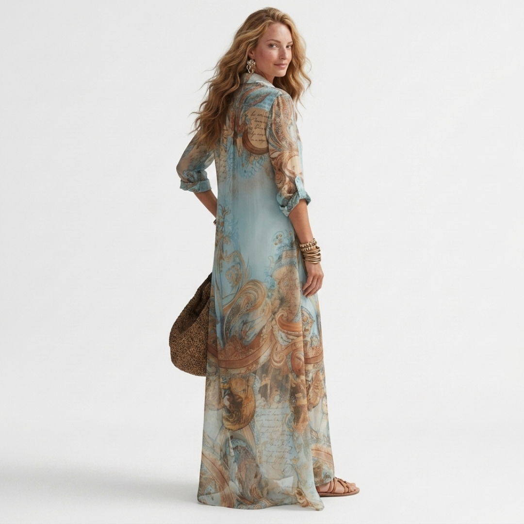 Printed long shirt dress with V-neck and three-quarter sleeves, side view, aqua and tan.