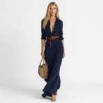 Long deep V-neck navy maxi dress with three-quarter sleeves and brown belt