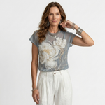 Lorena floral-print blouse with crew neck, short sleeves, and white flower print