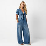 Blue denim V-neck tie-front short-sleeve jumpsuit with button placket, patch pockets, wide legs