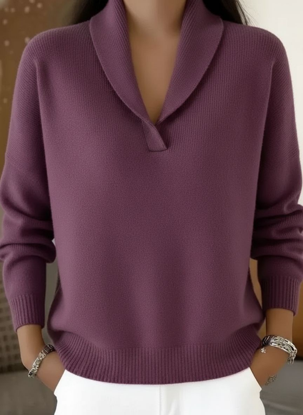 Purple V-neck knit sweater with long sleeves and ribbed cuffs and hem