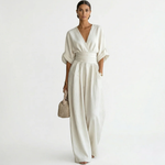 Ivory v-neck belted jumpsuit with gathered waist and wide-leg pants