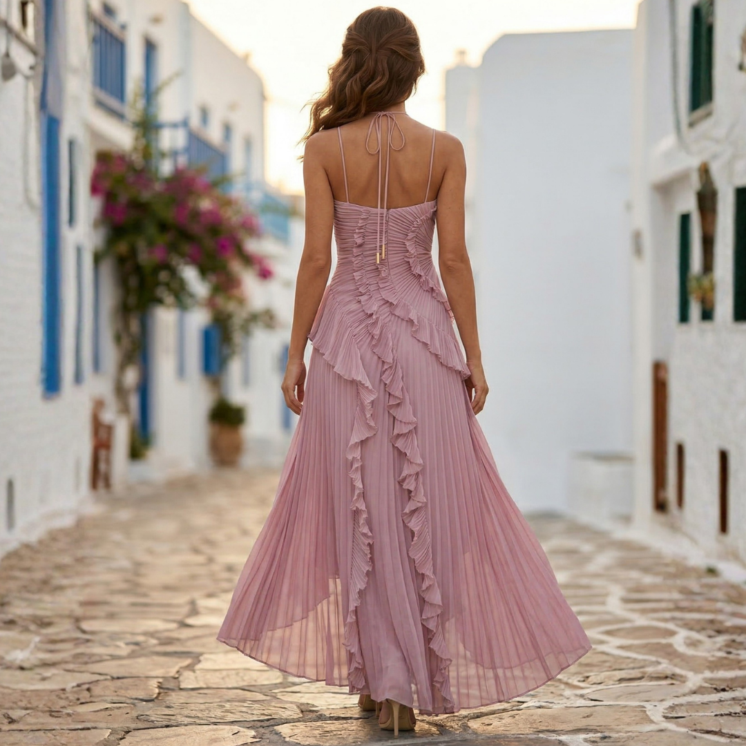 Back view of pink ruffle maxi dress with thin straps and open mid-back detail