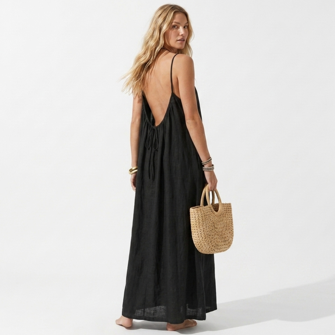 Lightweight black summer dress with spaghetti straps and open back, maxi length