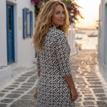 Button-front patterned tunic and ankle pants set with detailed collar, dark and white print