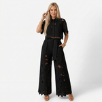 Black lace two-piece set with cropped short-sleeve jacket and wide-leg pants