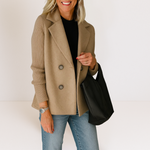 Beige casual blazer with notch lapels, ribbed sleeves, and two-button front