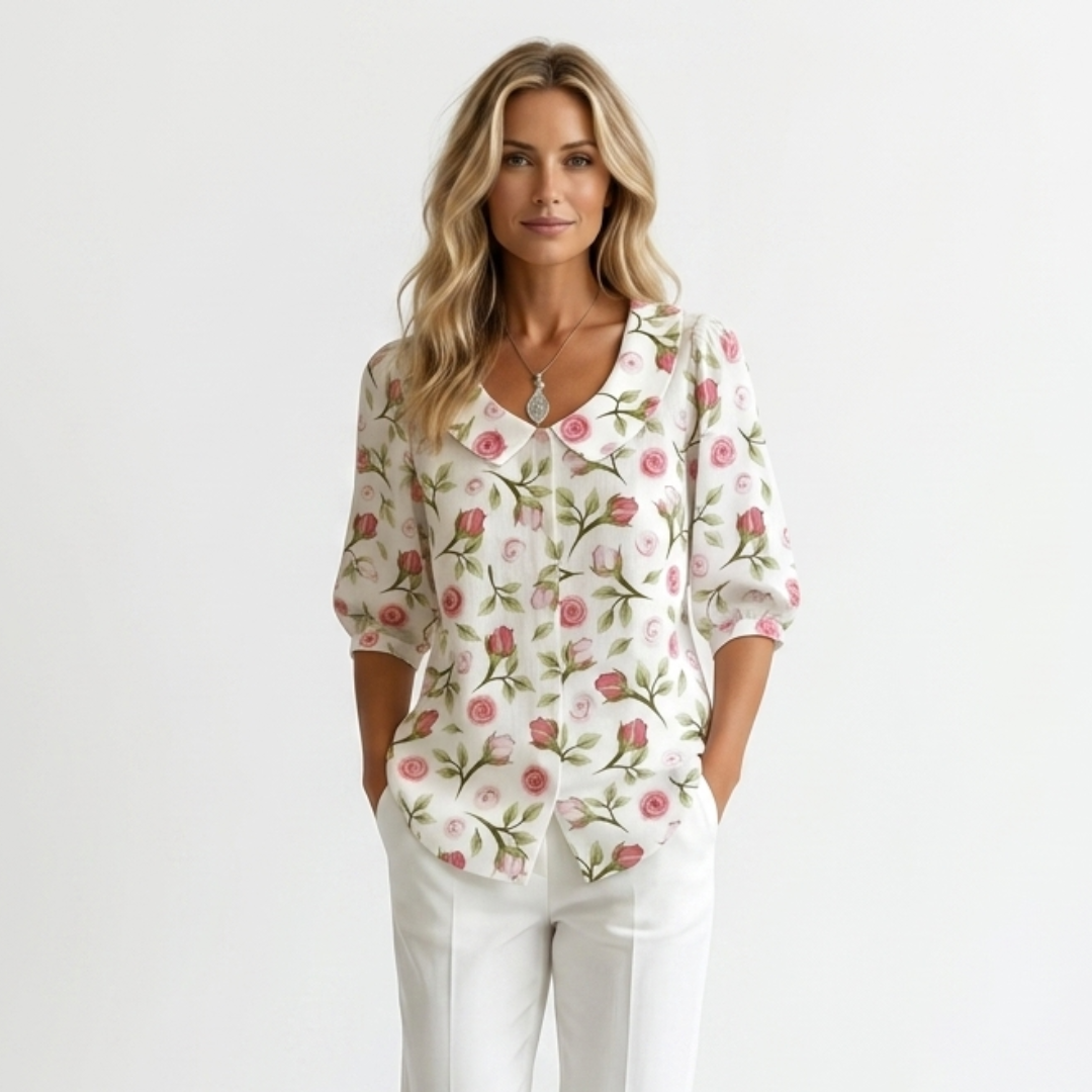 White floral button-front blouse with pointed collar and half sleeves